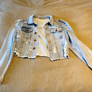 Distressed denim jacket